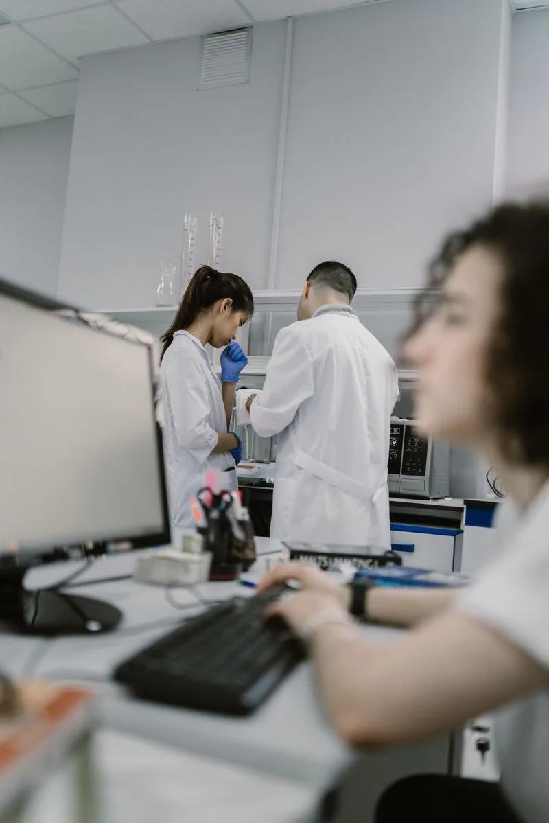 Researchers reviewing results together in a contract research laboratory